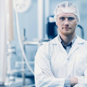 portrait male scientist worker medicine factory research laboratory plant technician in hygiene